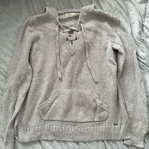 Hollister beige hooded sweater. Tie up detailing in front. Size Large